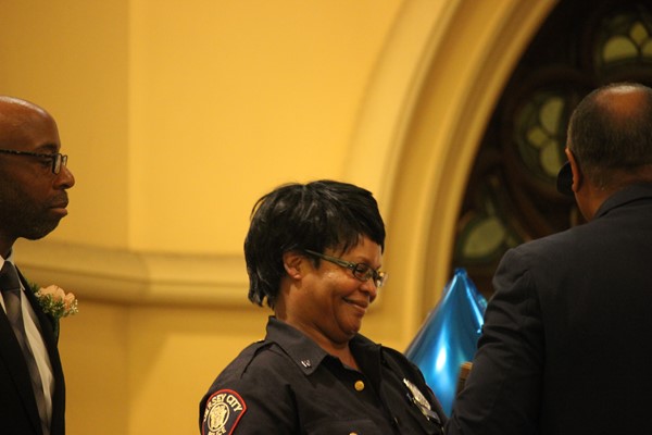 Honoree Officer J McGhee receives award